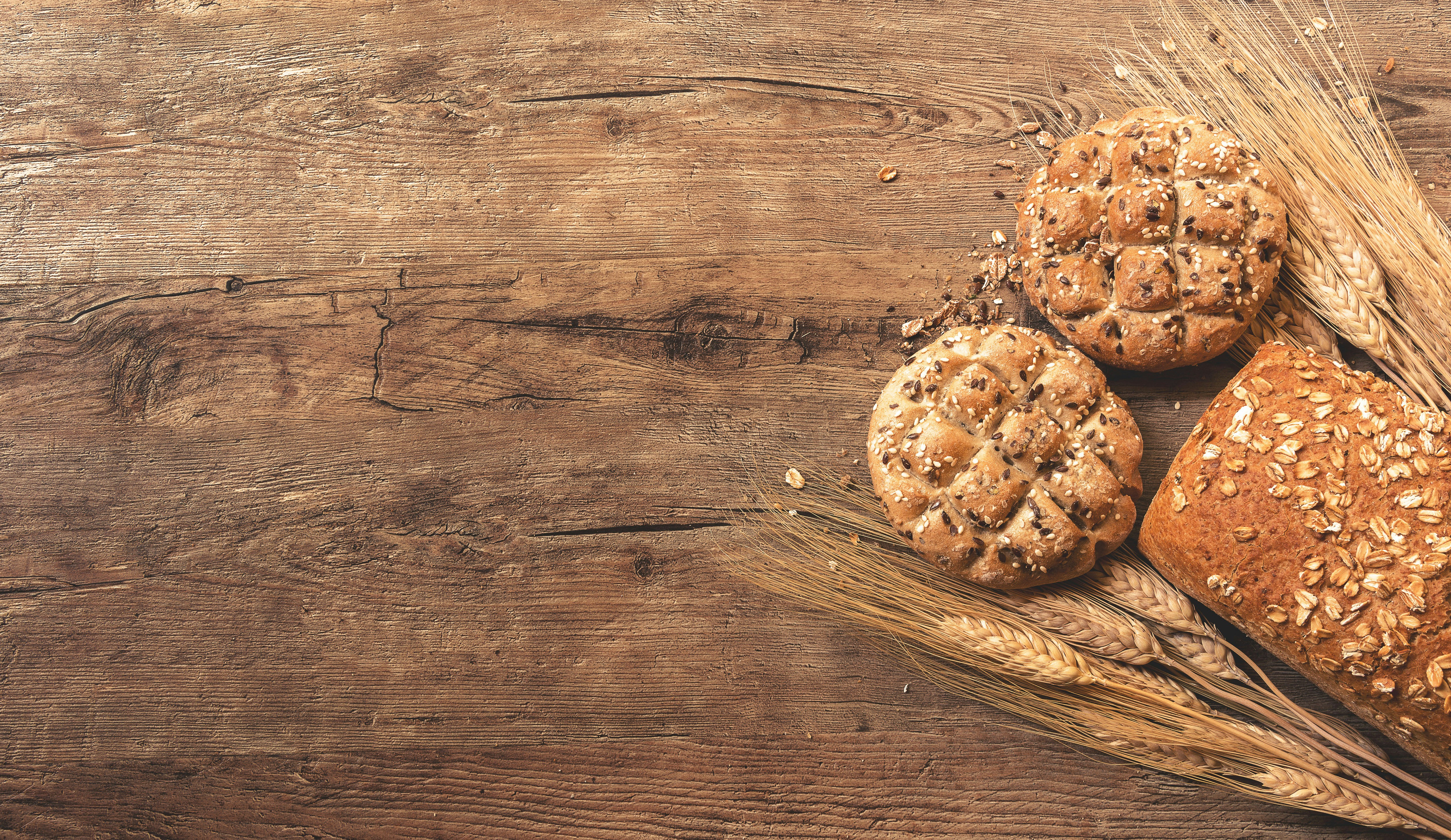 Artisanal sourdough loaves on wooden board